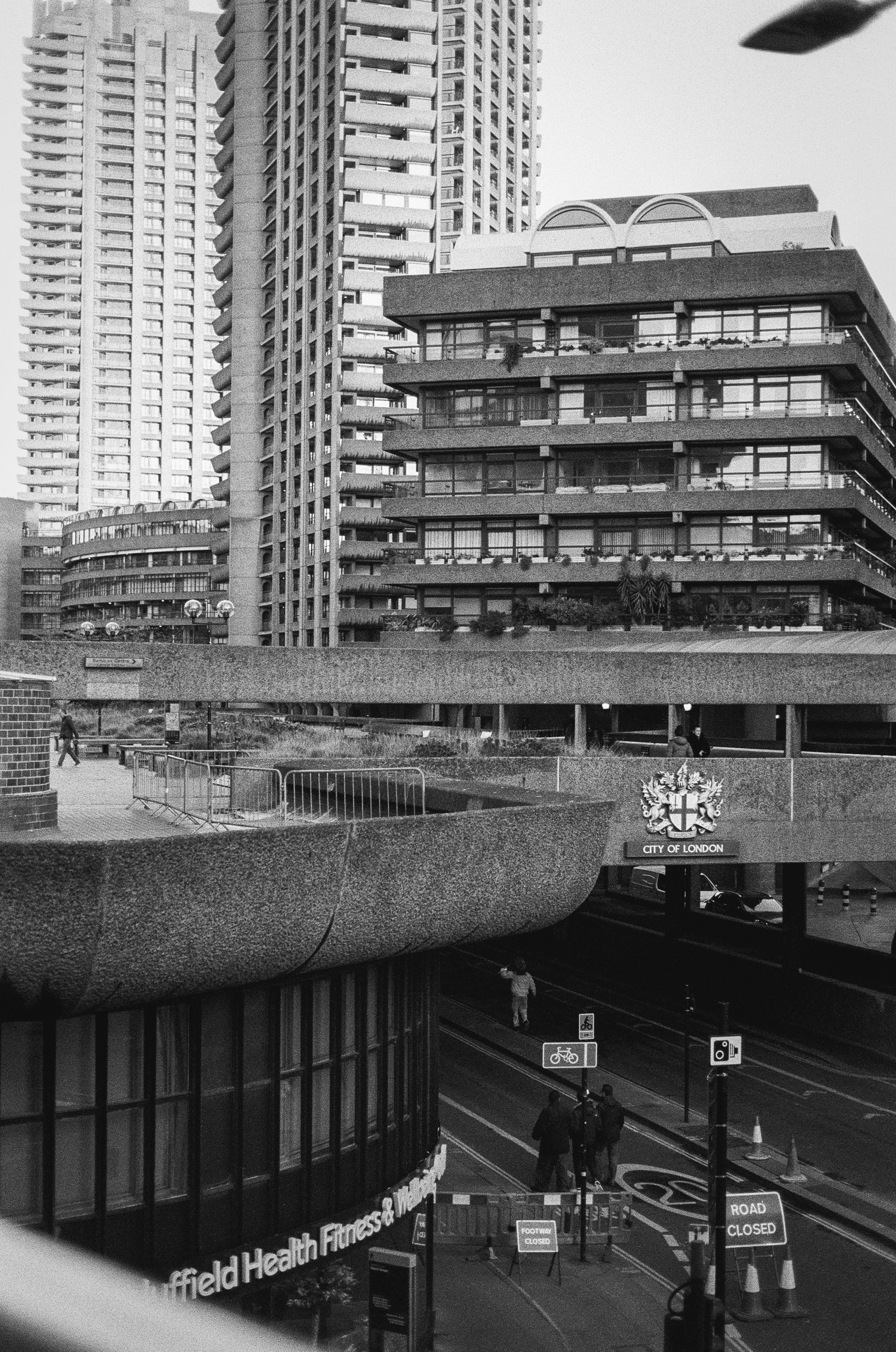 Black and white film photo of an old street scene
