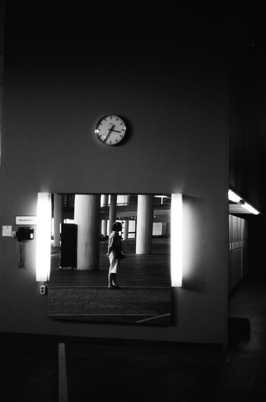 the woman in the night light shot on black and white film