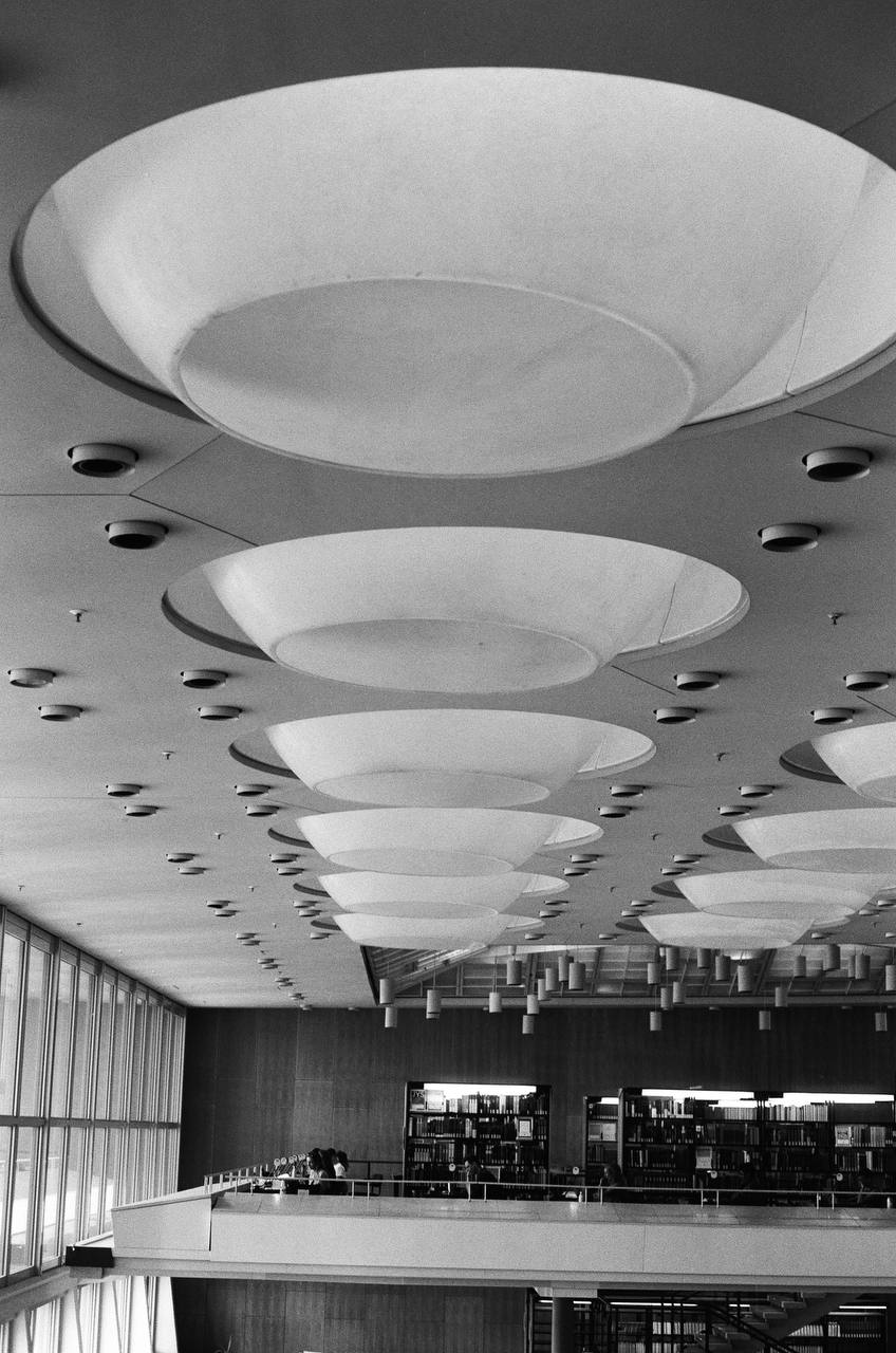 the ceiling lamps on the day captured on black and white film
