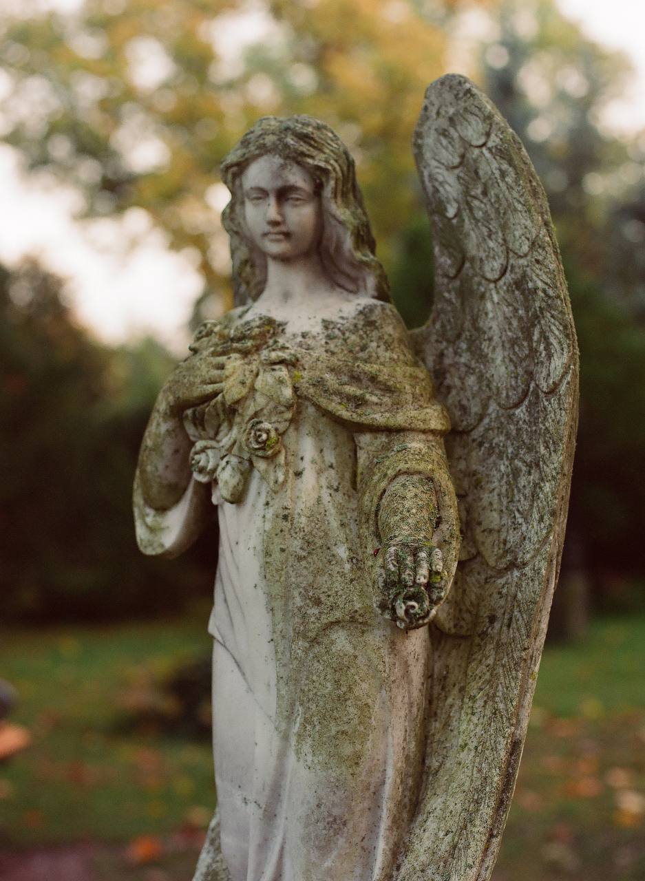 stone angel scaptured on С41 color negative film