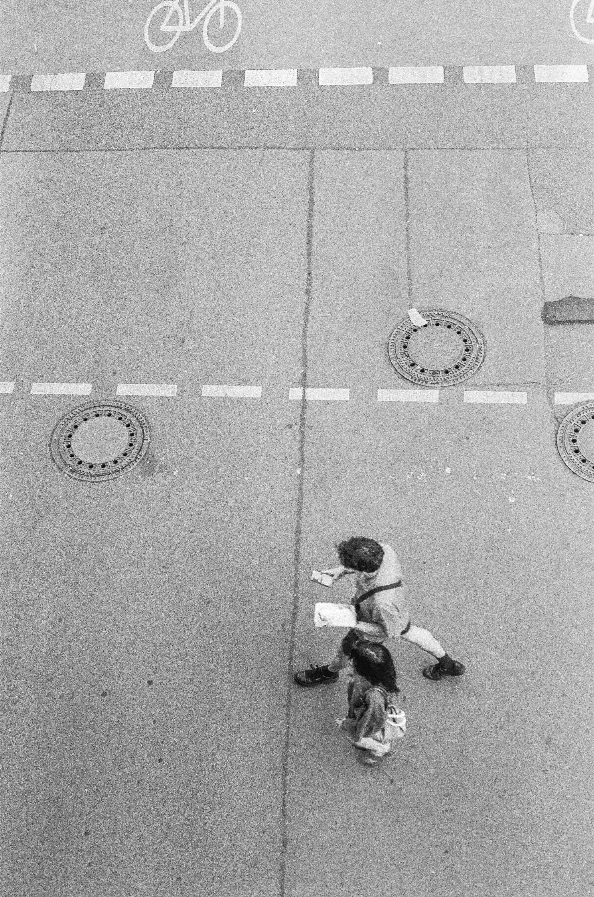 the walking people shot on black and white film