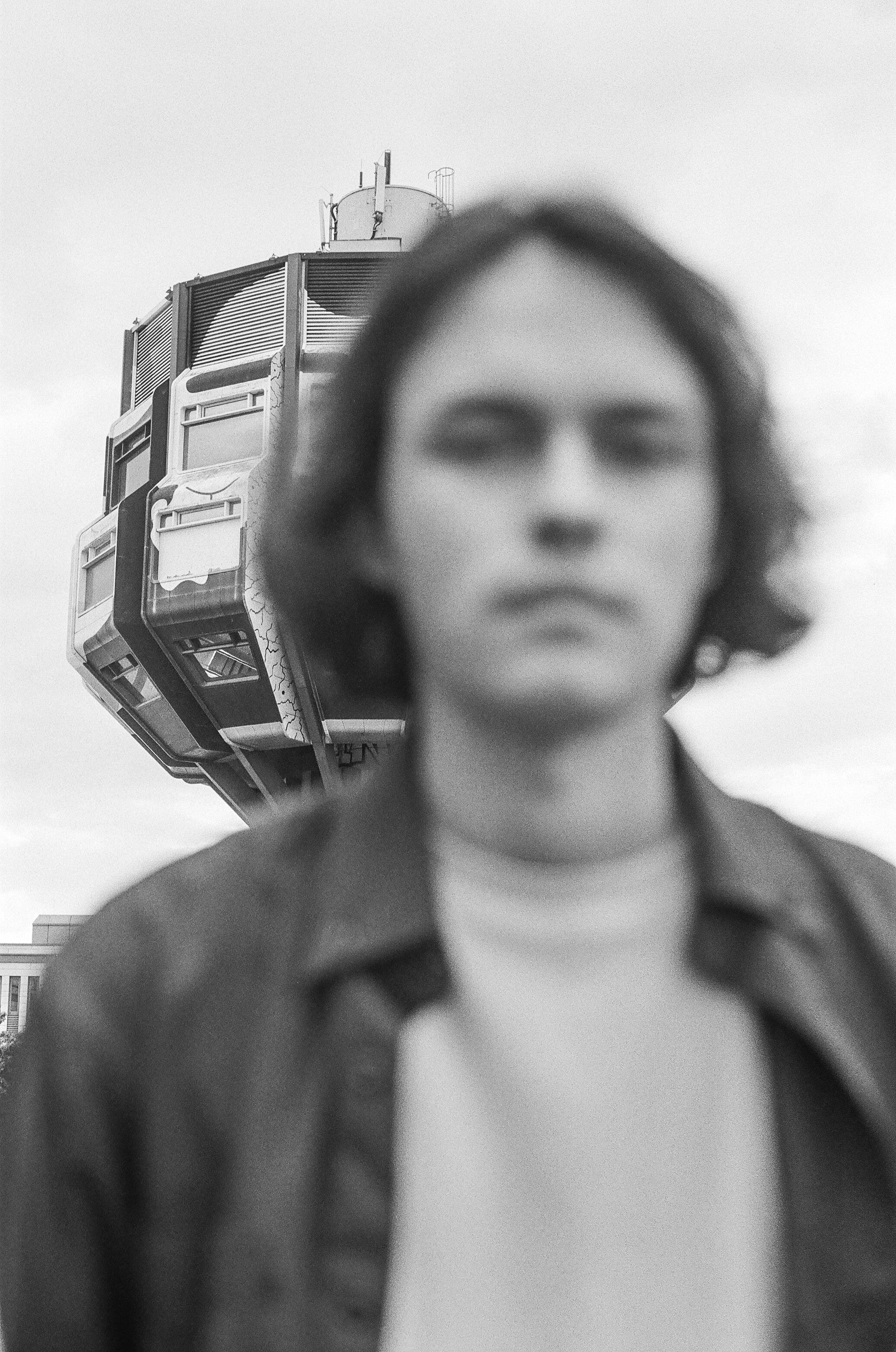 Portrait with blurred film grain on black and white film