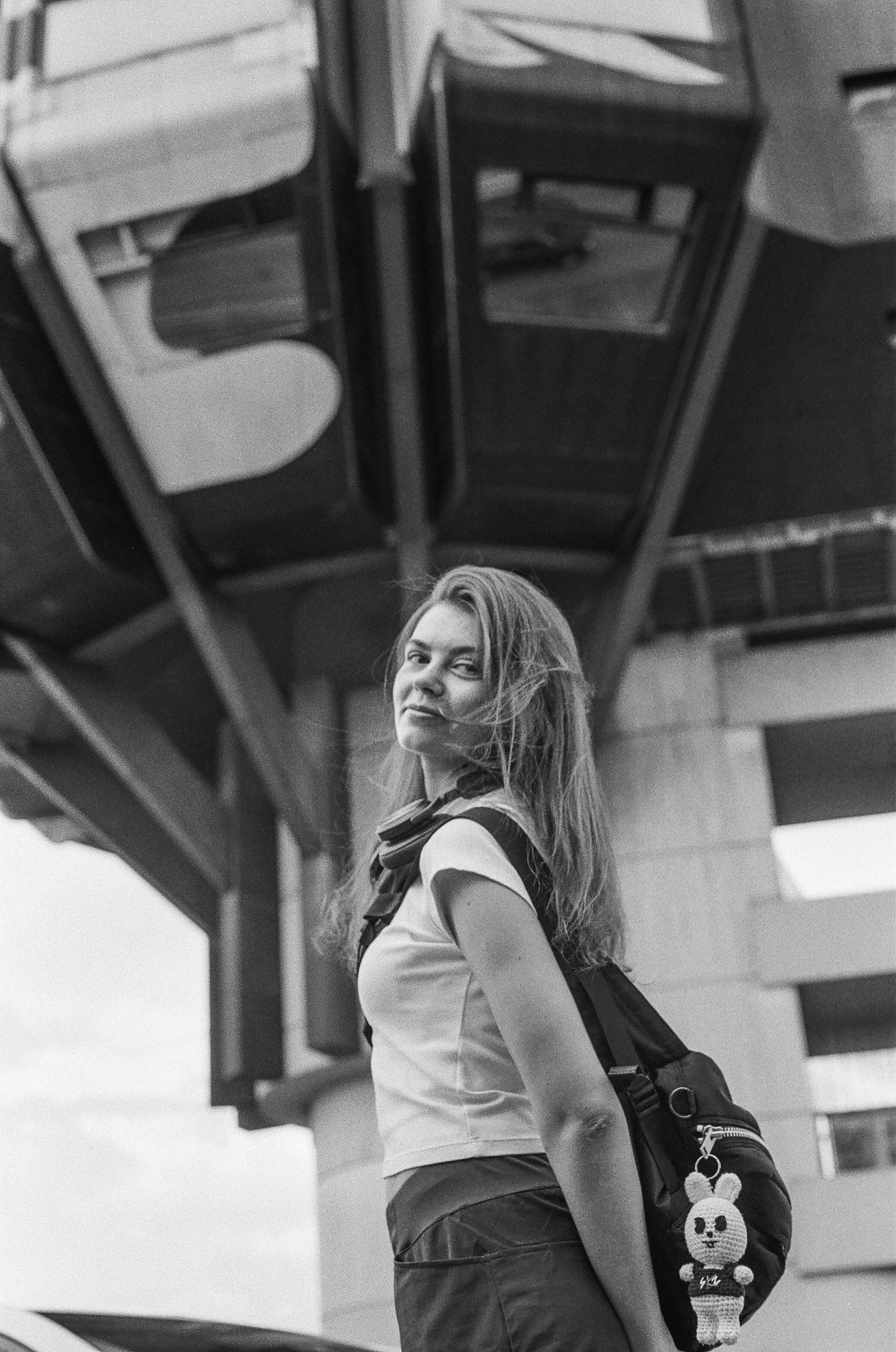 girl with rabbit toy on black and white film