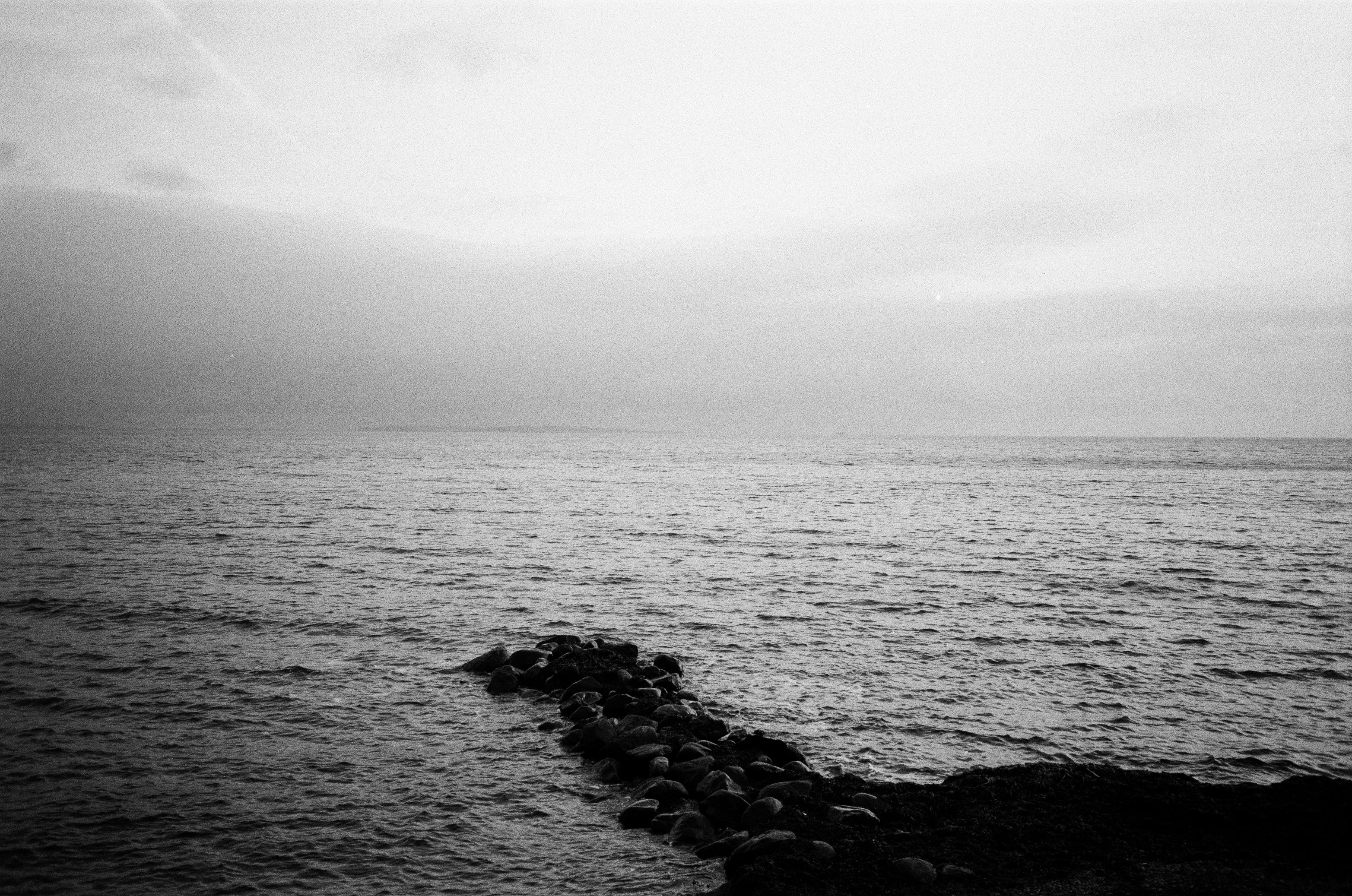 sea on grainy black and white film