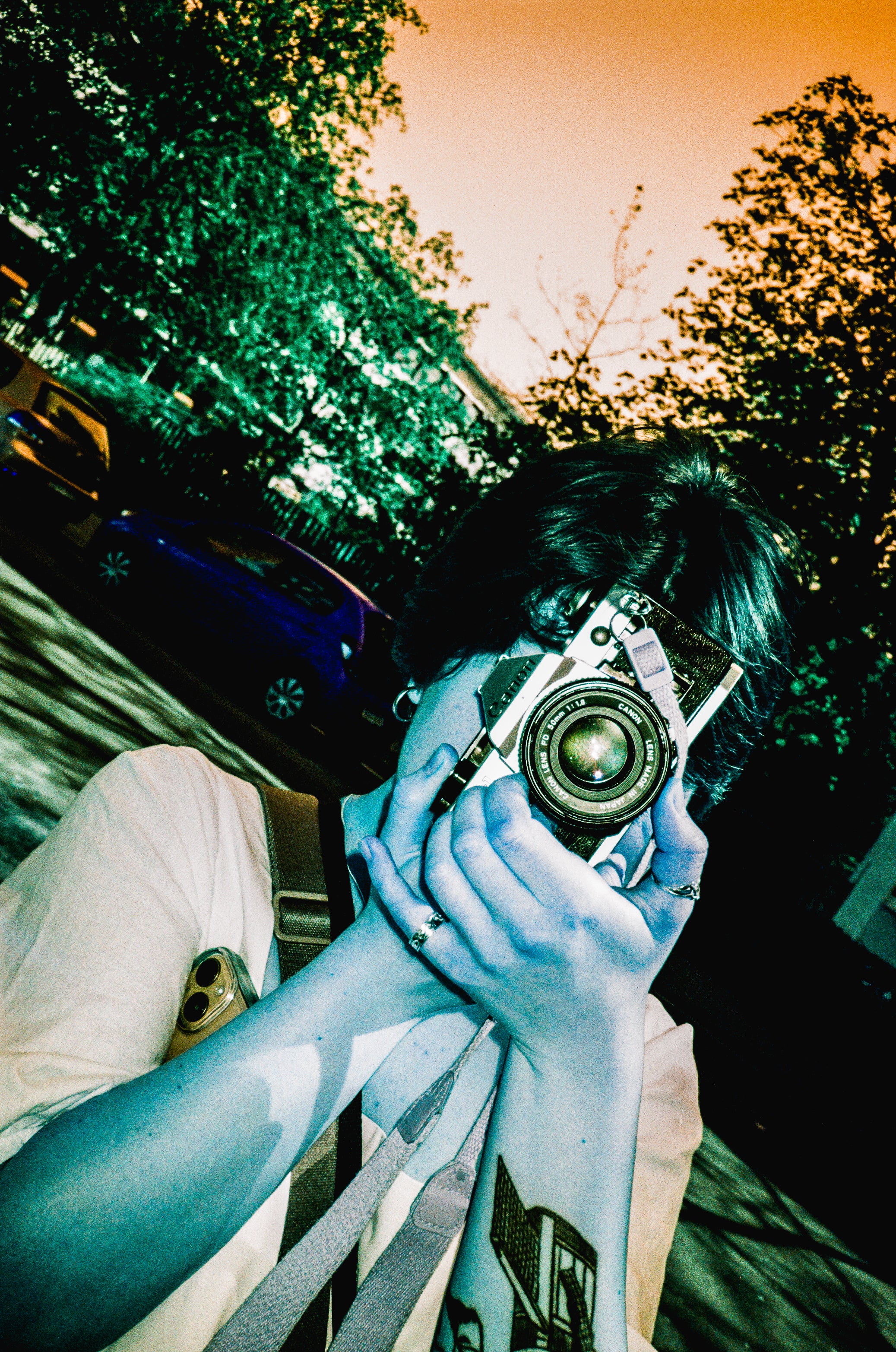 girl with film camera captured on С41 color negative film