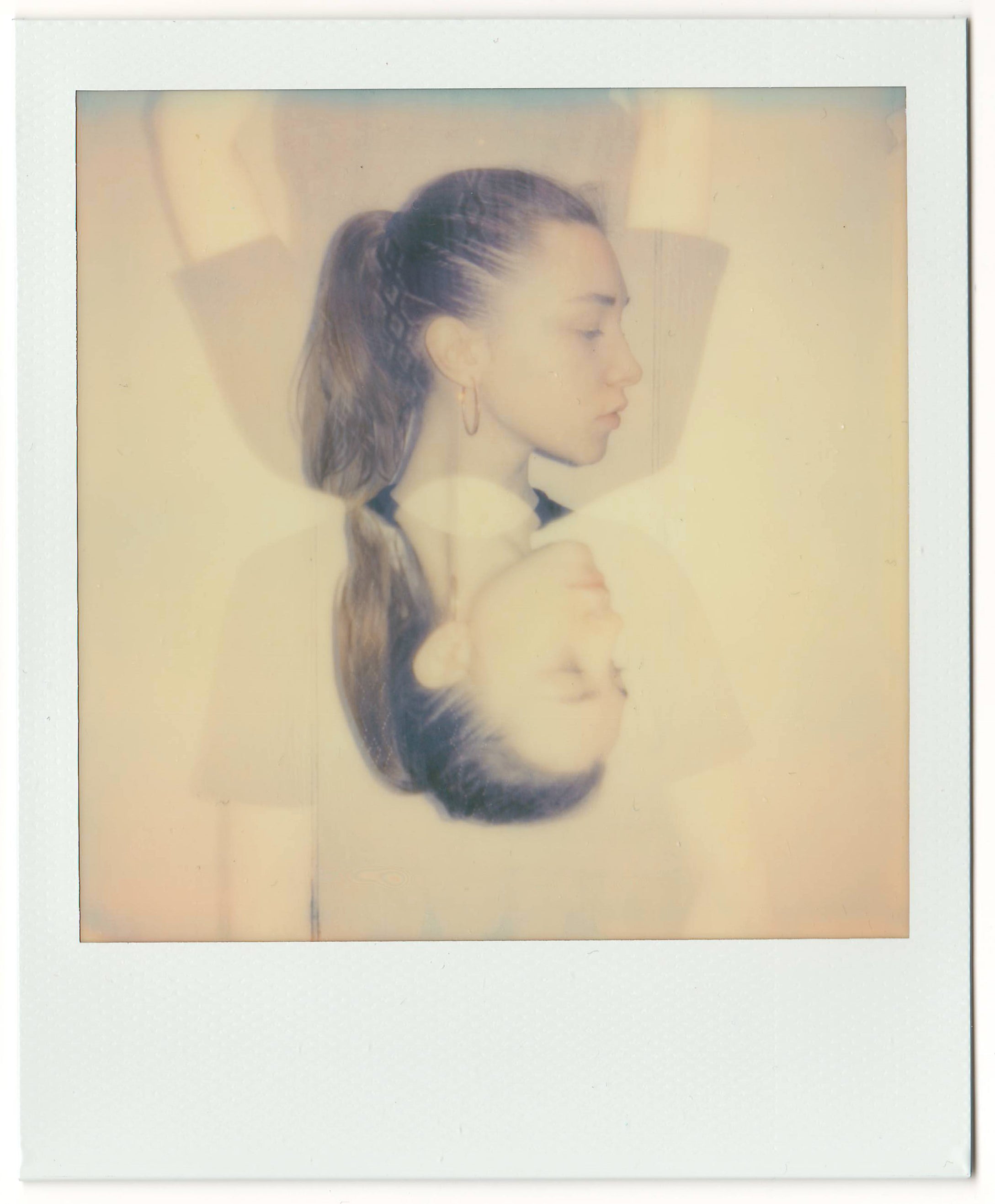 instant photo camera Polaroid image in pink