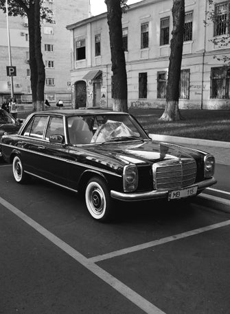 old car shot on Kodak Tmax 400 black and white negative film