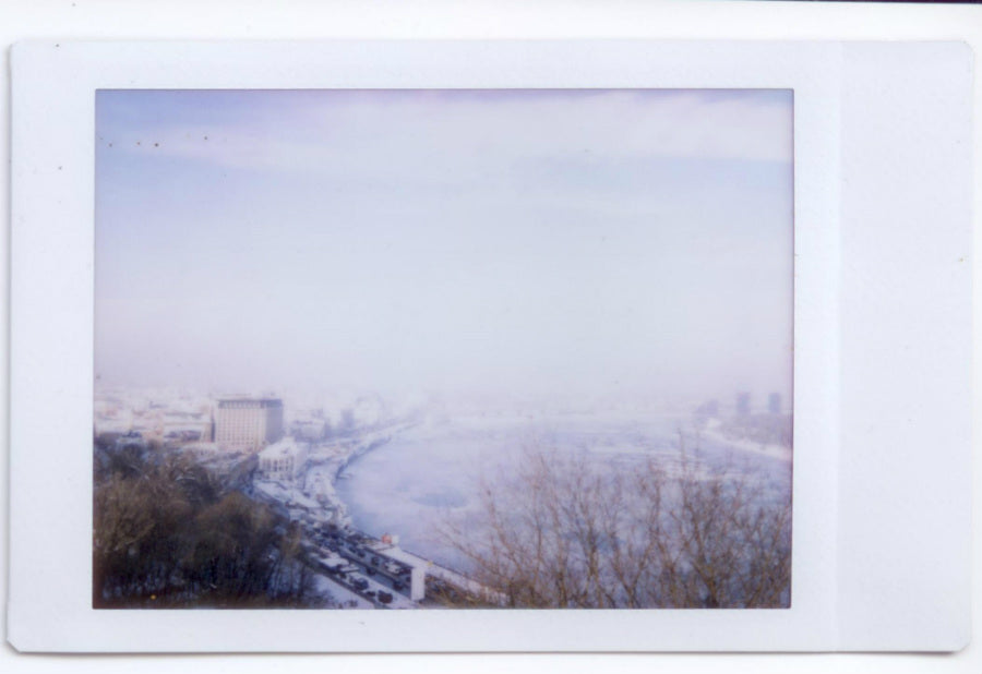 Fujifilm Instax film capturing winter city river