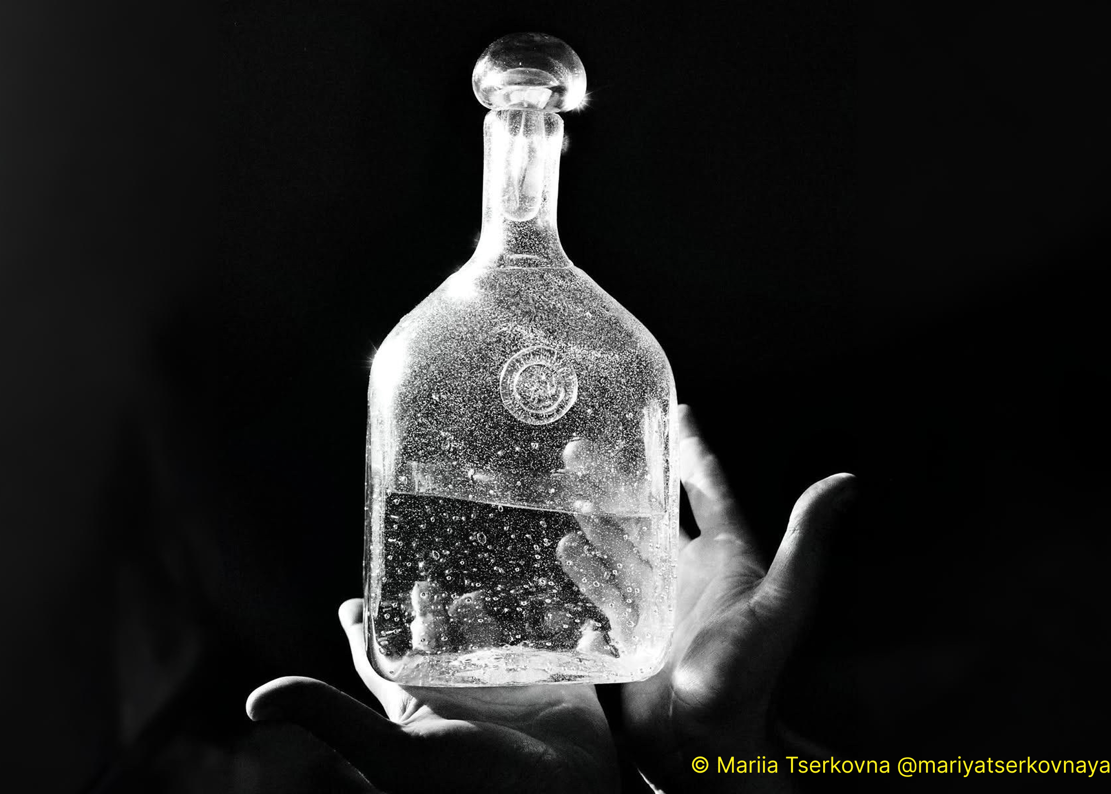 glass bottle still life with high contrast from black and white film developing by Film Speed Lab