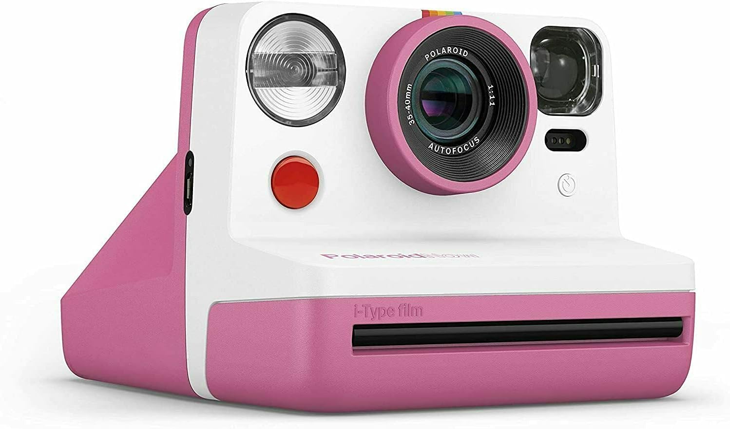 Pink and white Polaroid camera on a white background